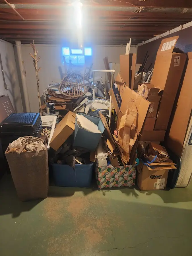 Roll-off dumpster container at job site for Yard Waste Dumpster Rental in East Granby